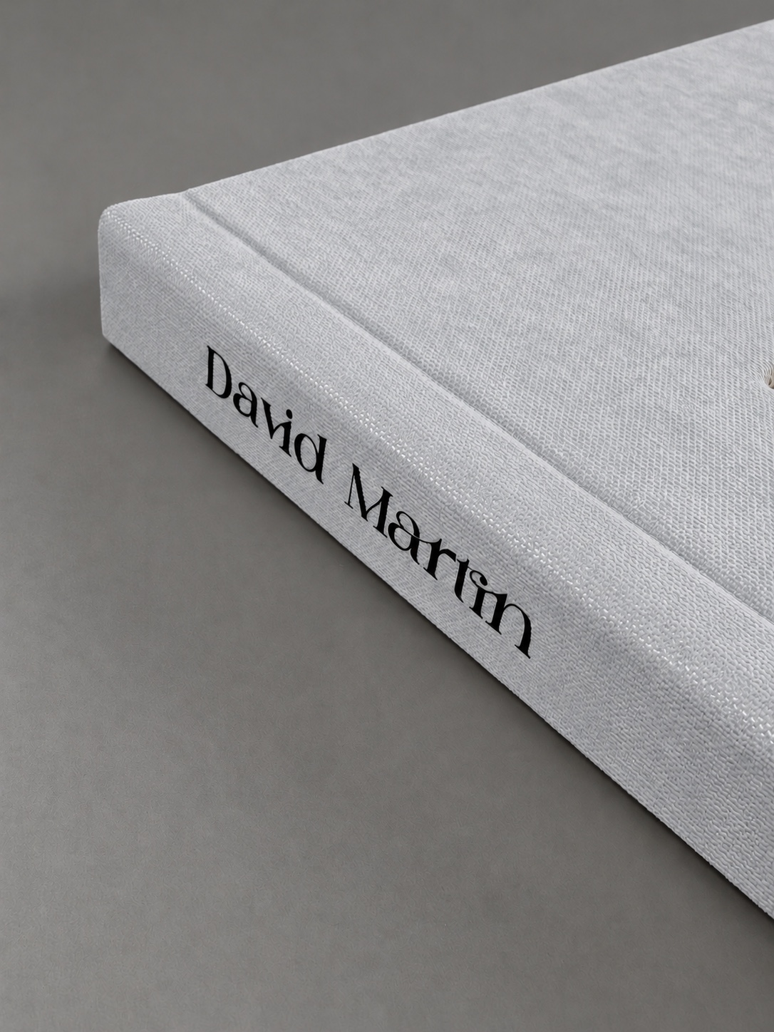 Pale grey David Martin album with personalised spine