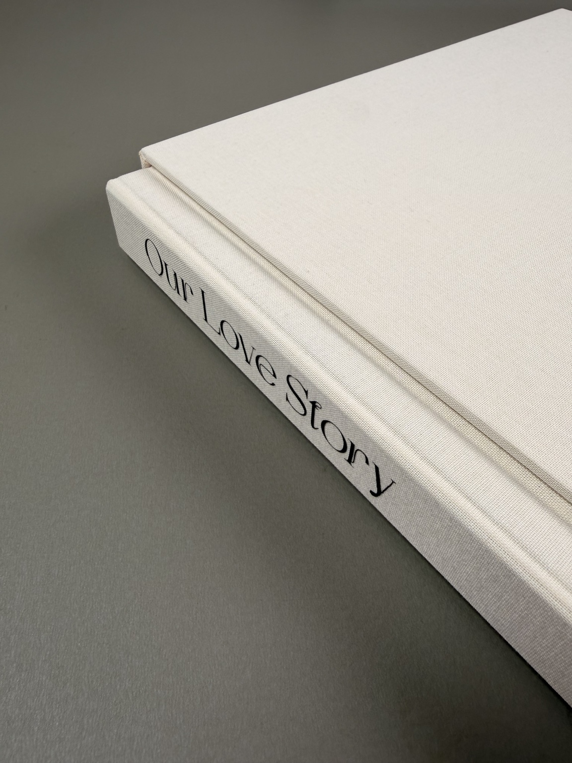 Ivory album with Our Love Story spine lettering