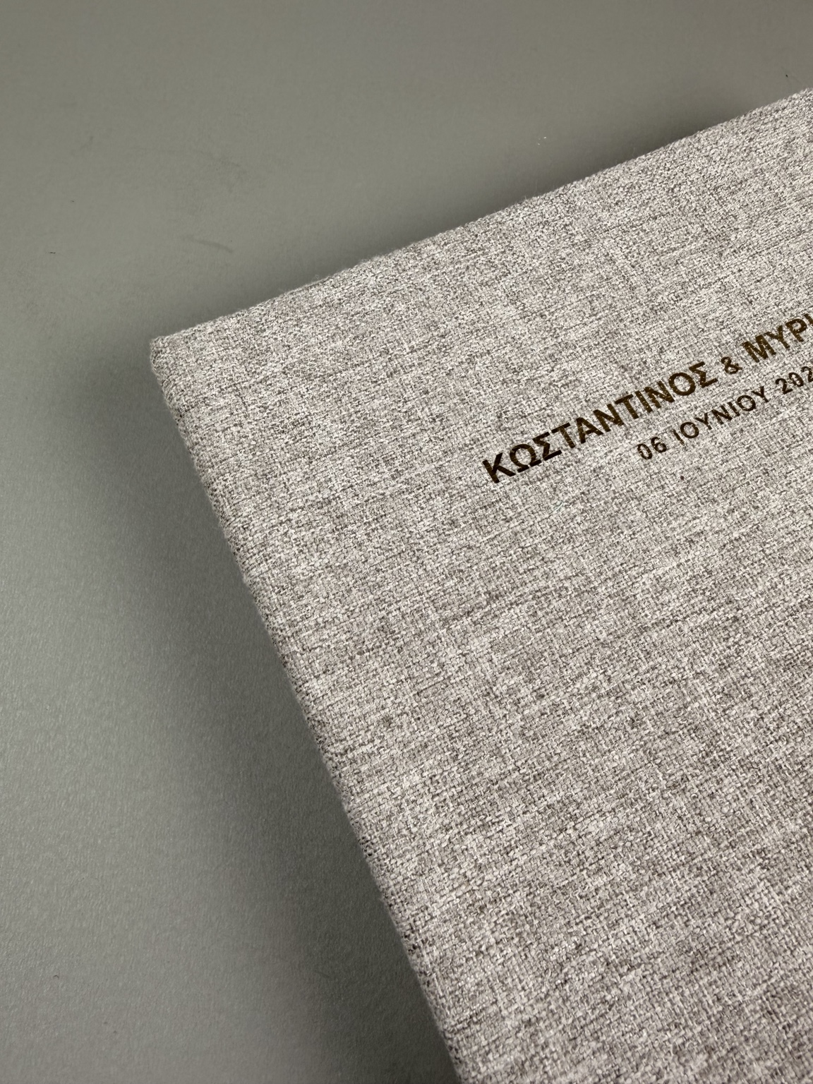 Textured grey album with personalised Greek lettering